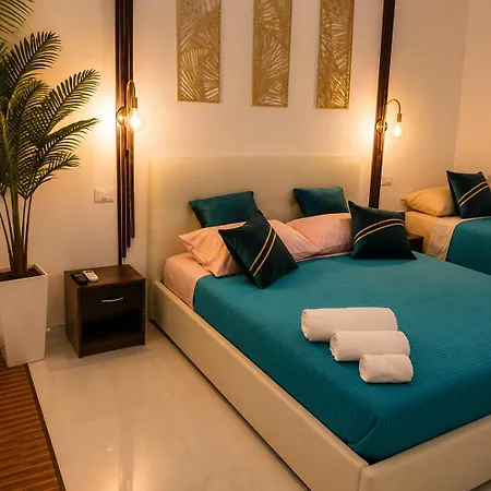 Monolocale Elegante Con Design Moderno E Atmosfera Tropical Chic *